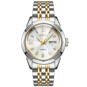 Reloj de cuarzo elegante para mujer en oro-plata con esfera de nácar y fecha