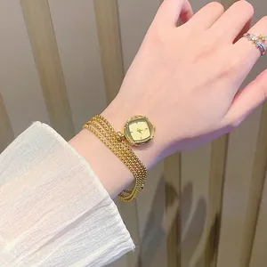 Elegant vintage square gold watch necklace featuring a delicate multi-layer thin chain