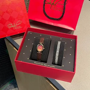 Elegantes Vintage-Gold-Damenuhr und Diamant-Armband Geschenkset in einer roten Box