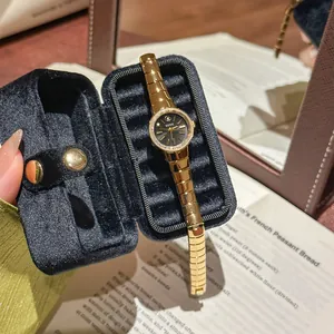 Reloj dorado de lujo vintage para mujer con esfera negra y correa de eslabones