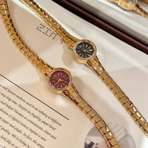 Reloj vintage dorado para mujer con esfera redonda pequeña y elegante correa de eslabones