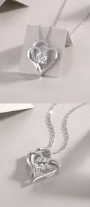 Close-up of a sparkling 1-carat moissanite heart pendant on a 925 sterling silver chain