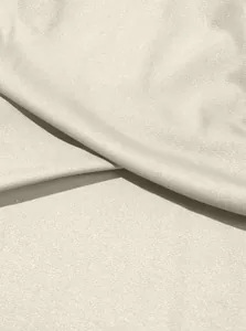 Detailed close-up showing the premium texture of cream small twill pearl cotton fabric