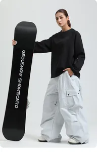Detailed view of loose waterproof snowboarding pants with cargo pockets