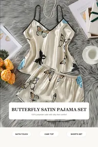 Detailed look at the elegant butterfly print on a silky-soft satin cami pajama set