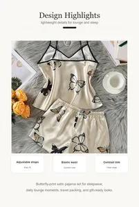 Close-up detail of the butterfly-print satin pajama set showing its design highlights