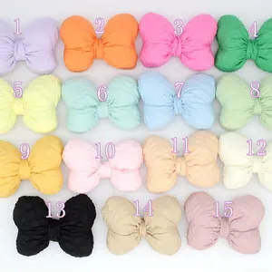 15 colors of candy-toned cotton-filled fabric butterflies for DIY hair accessories