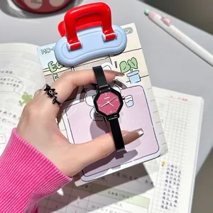 Minimalist octagonal women's quartz watch with pink dial and black leather strap.
