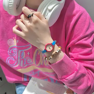 Colorful dopamine octagonal quartz watch for women with pink sweatshirt and white headphones