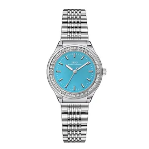 Montre de luxe IBSO pour femme en argent avec cadran bleu et strass brillants.