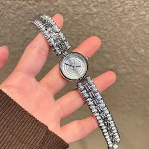Elegant silver vintage ladies bracelet watch featuring a quartz movement and round dial