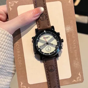 Unisex fashion quartz watch with brown leather strap and iconic peace sign dial.