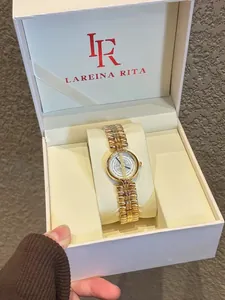 Elegant gold bracelet watch for women presented in a luxury Lareina Rita gift box