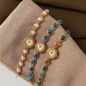 GEDI Montre Bracelet à Quartz Rétro pour Femmes Vintage Luxe Léger Ton Or Bijoux Montre Jonc Avec Pierres de Turquoise Perles pour Femmes