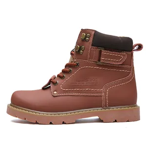 Detailed side view of classic brown leather work boots featuring durable rubber outsole
