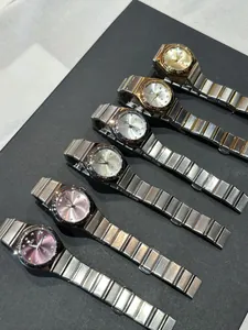 Grupo de relojes de cuarzo GEDI para mujer con correas de acero y esferas de colores