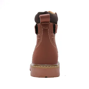 Rear view of vintage brown leather men's boot showing stitching and thick rubber sole