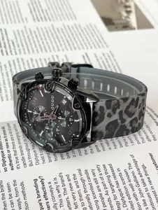 Macro view showing the detailed texture of the leopard-print silicone strap and dial