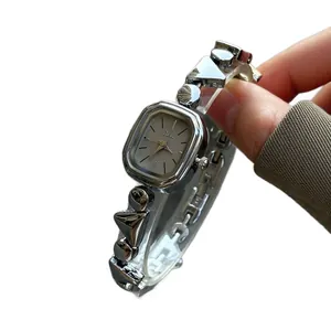 Vintage silver irregular bracelet quartz watch for women with elegant design