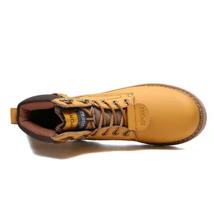 Detailed top-down view of a yellow leather work boot with brown lining and sport tag