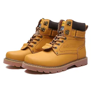 Detailed side view of classic yellow nubuck leather work boots for men with durable soles