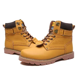 Detailed side view of classic yellow leather boots with rugged lug sole and sport branding