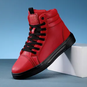 Vibrant red high-top casual leather boots with black laces and sturdy rubber soles
