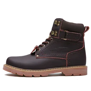 Detailed side profile of vintage brown leather work boots with durable rubber outsole.