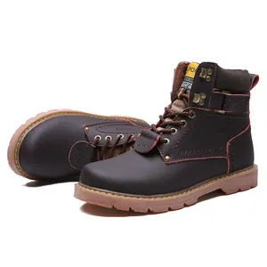 Detailed view of brown leather retro work boots for men with durable rubber soles.