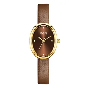 Montre quartz GEDI femme élégante, boîtier doré ovale et bracelet en cuir brun