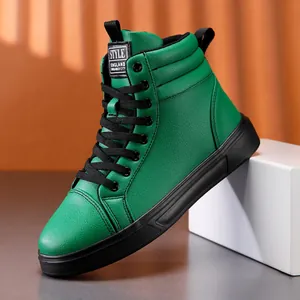Detailed view of green high-top fashion boot with black laces and leather texture.