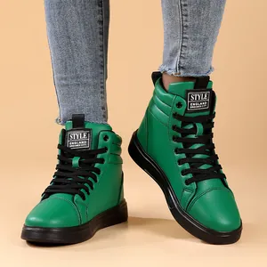 Bright green high-top leather boots with black laces and thick soles for unisex style