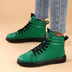 Vibrant green high-top leather fashion boots with black laces and thick soles for casual wear