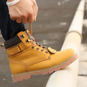 Close-up of yellow leather work boot featuring Goodyear welted construction details.
