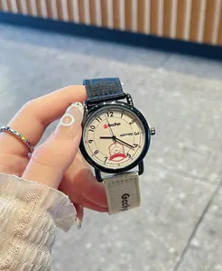 Detailed view of GCCLIYO quartz watch with cartoon dog dial and dual-color canvas strap