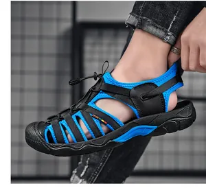 Close-up of breathable blue and black men's outdoor sandals with elastic drawstring.