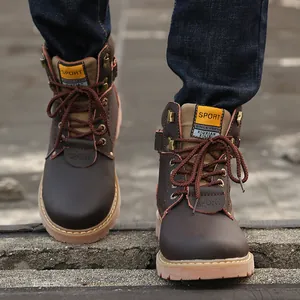 Detailed view of the front and lacing of retro brown leather men's boots