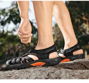 Close-up of men's breathable hollow-out outdoor sandals with quick-tie laces