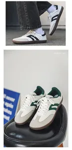 Detailed macro view of comfortable wide-toe barefoot sneakers in white and green colors