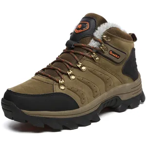 Detailed shot of high-top men's warm hiking boots with brown suede and plush fur lining