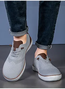Detail view of men's wide toe barefoot shoes with breathable grey mesh upper