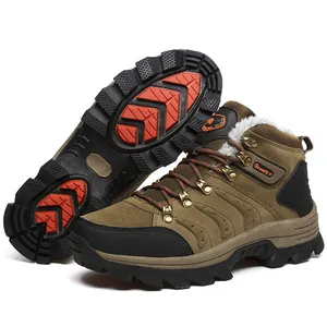 Detailed view of waterproof winter hiking boots showing rugged non-slip rubber sole