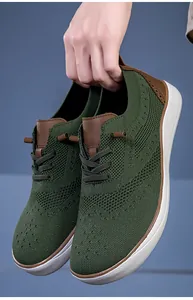 Lightweight green mesh men's wide toe barefoot sneakers with stylish brown accents