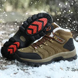 Close-up detail showing durable non-slip sole on waterproof winter hiking boots in snow