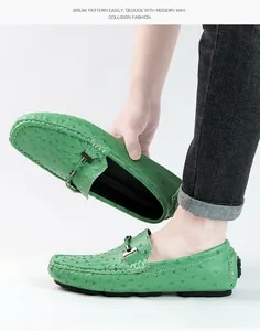 High-quality green ostrich-textured men's loafers featuring stylish metal buckle detail