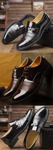 Detailed view of men's formal dress shoes in black and brown with patent leather finish