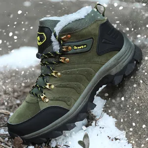 Macro view of olive green winter hiking boot with warm fur lining and thick sole