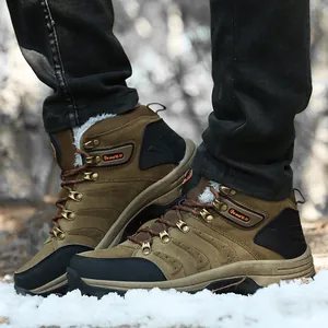 Detailed side view of warm brown high-top outdoor hiking snow boots with faux fur lining