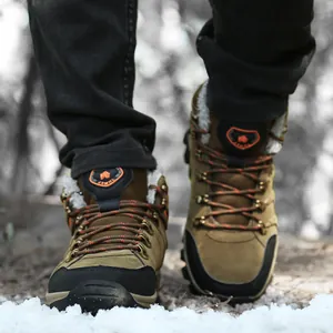 Detailed view of warm waterproof high-top winter boots for outdoor hiking in snow