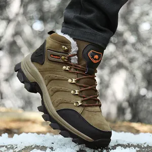 Close-up of winter high-top hiking boot with warm fleece lining in snow scene